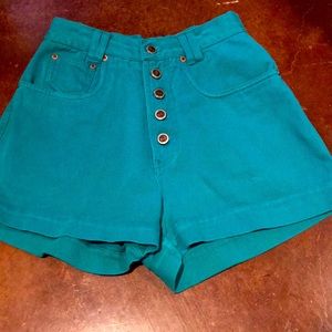 Rio button-fly shorts. Size 4. Waist size is 27”. Inseam is 2.5”.